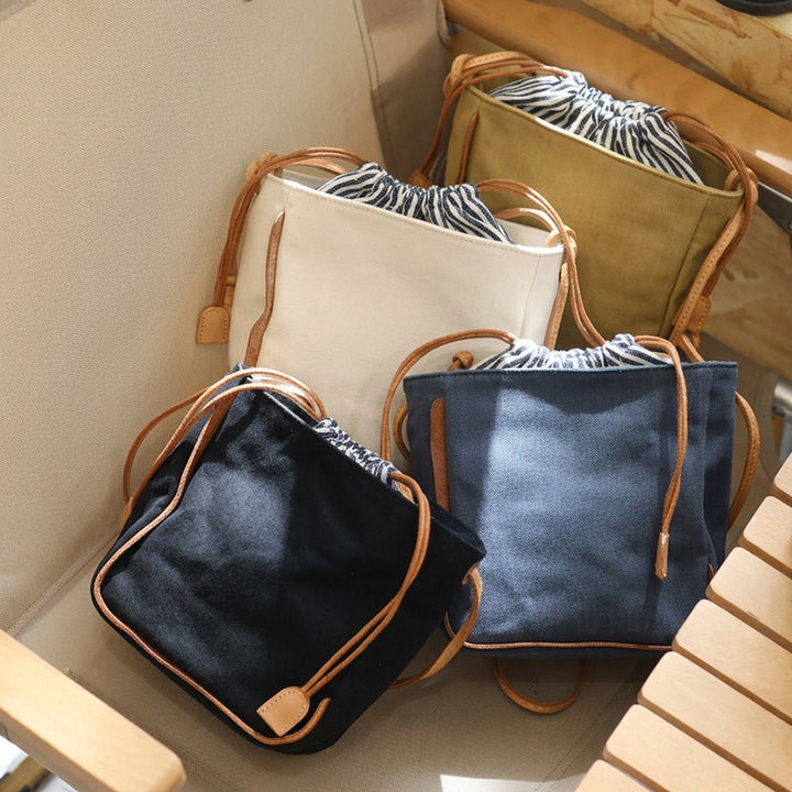 Canvas Bucket Bag with Leather Trim Drawstring Crossbody Mini Bag