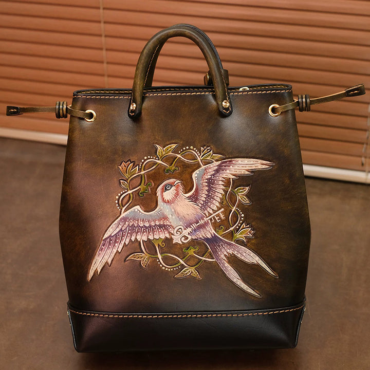 Hand-Tooled Leather Bucket Convertible Backpack with Bird &amp; Key Embossing