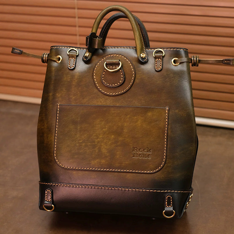 Hand-Tooled Leather Bucket Convertible Backpack with Bird &amp; Key Embossing