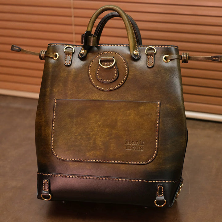 Hand-Tooled Leather Bucket Convertible Backpack with Bird &amp; Key Embossing