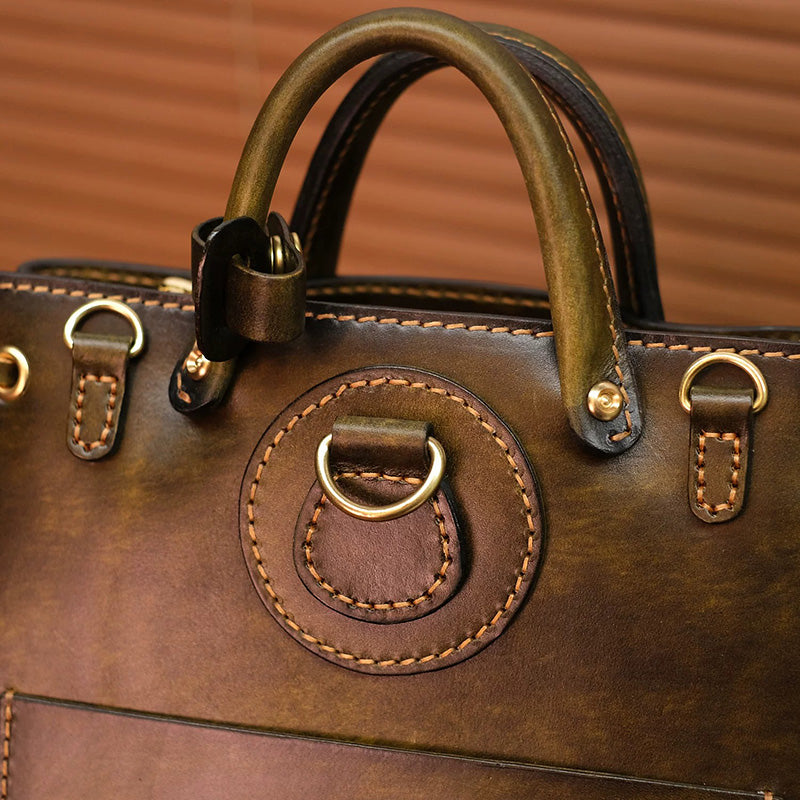 Hand-Tooled Leather Bucket Convertible Backpack with Bird &amp; Key Embossing