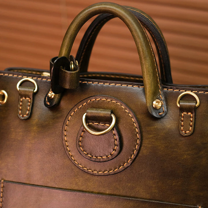 Hand-Tooled Leather Bucket Convertible Backpack with Bird &amp; Key Embossing