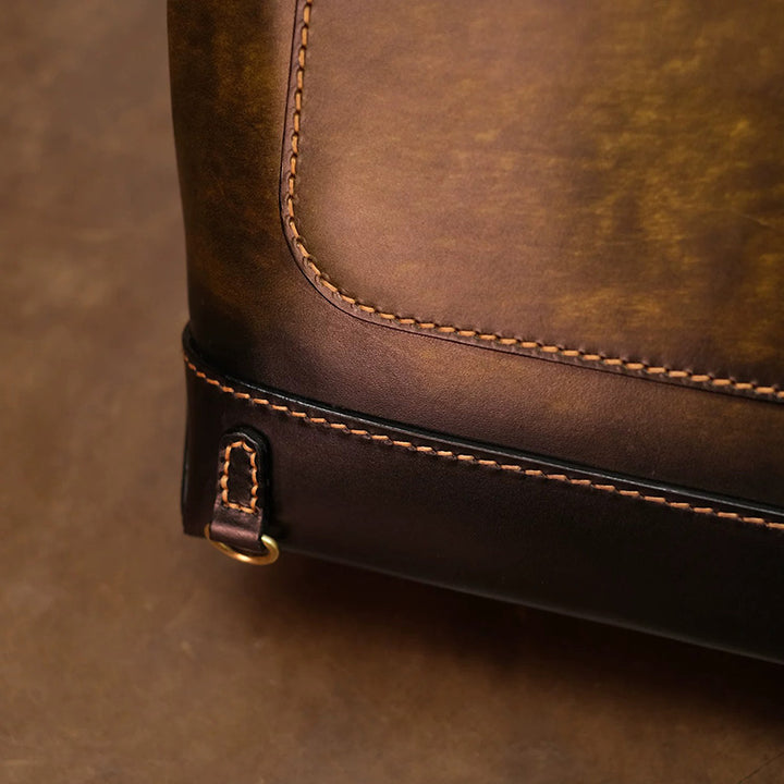 Hand-Tooled Leather Bucket Convertible Backpack with Bird &amp; Key Embossing