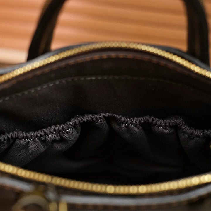 Hand-Tooled Leather Bucket Convertible Backpack with Bird &amp; Key Embossing