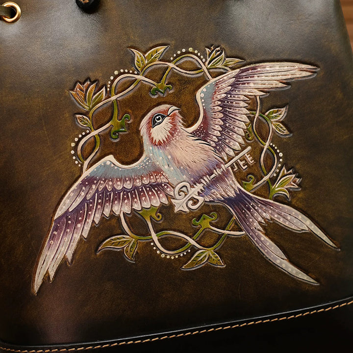 Hand-Tooled Leather Bucket Convertible Backpack with Bird &amp; Key Embossing
