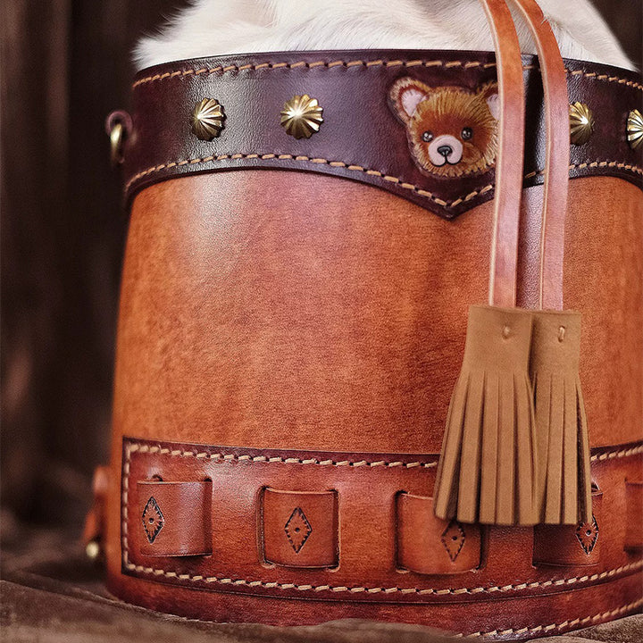 Hair-On Hide Leather Bucket Bag with Hand-Carved Bear Detail