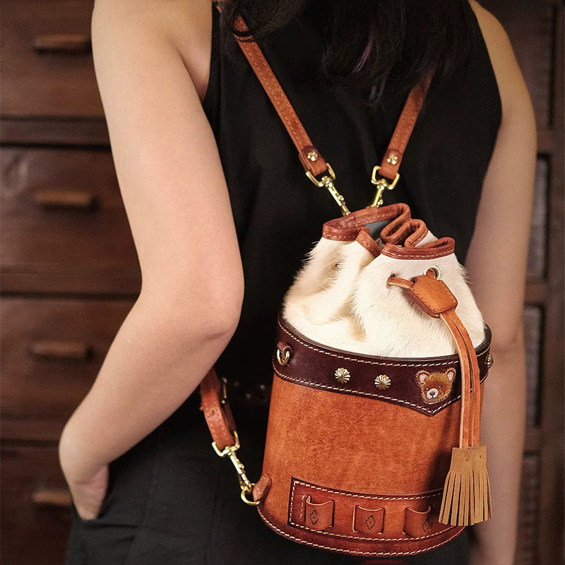 Hair-On Hide Leather Bucket Bag with Hand-Carved Bear Detail