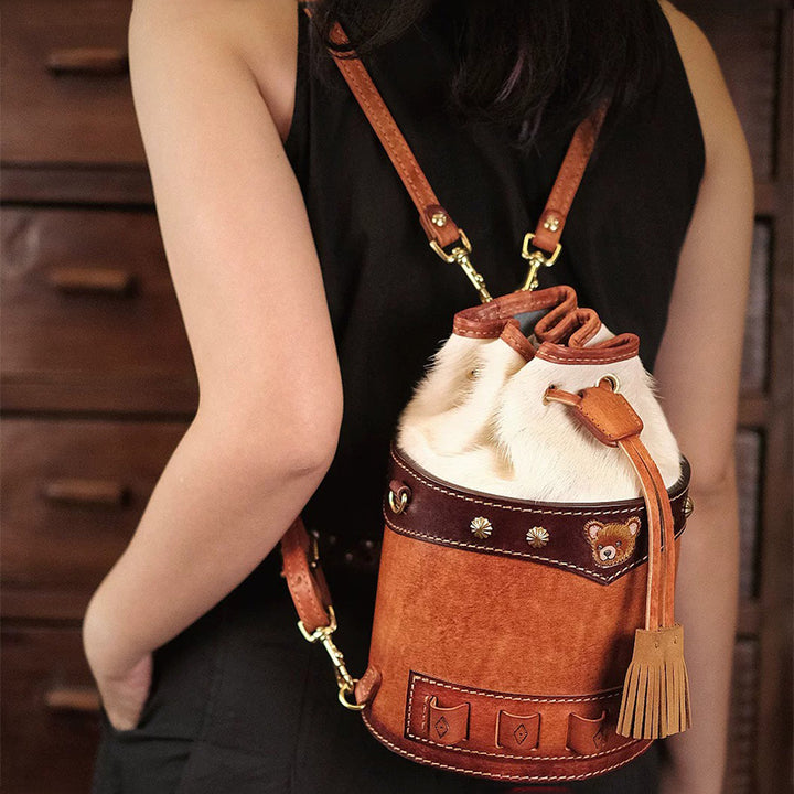 Hair-On Hide Leather Bucket Bag with Hand-Carved Bear Detail