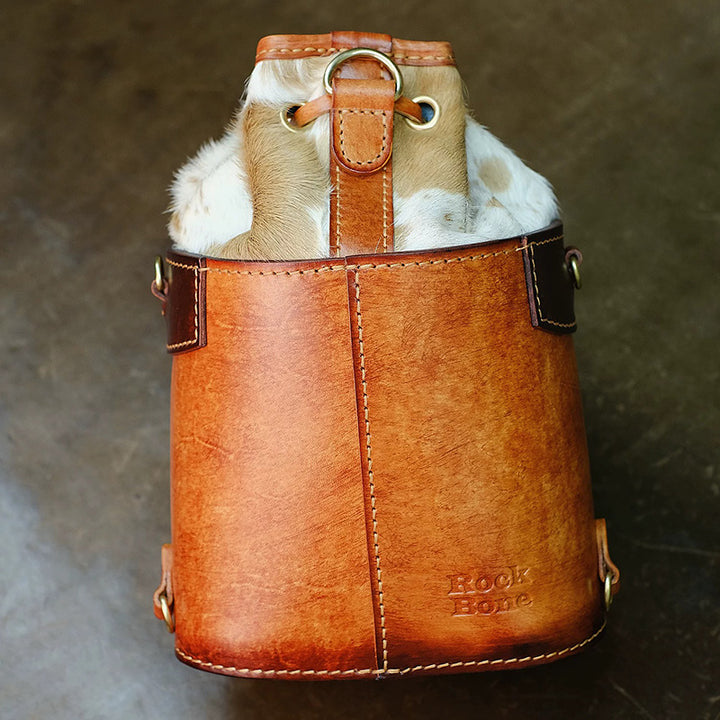 Hair-On Hide Leather Bucket Bag with Hand-Carved Bear Detail