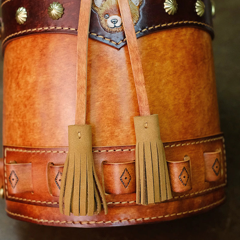 Hair-On Hide Leather Bucket Bag with Hand-Carved Bear Detail