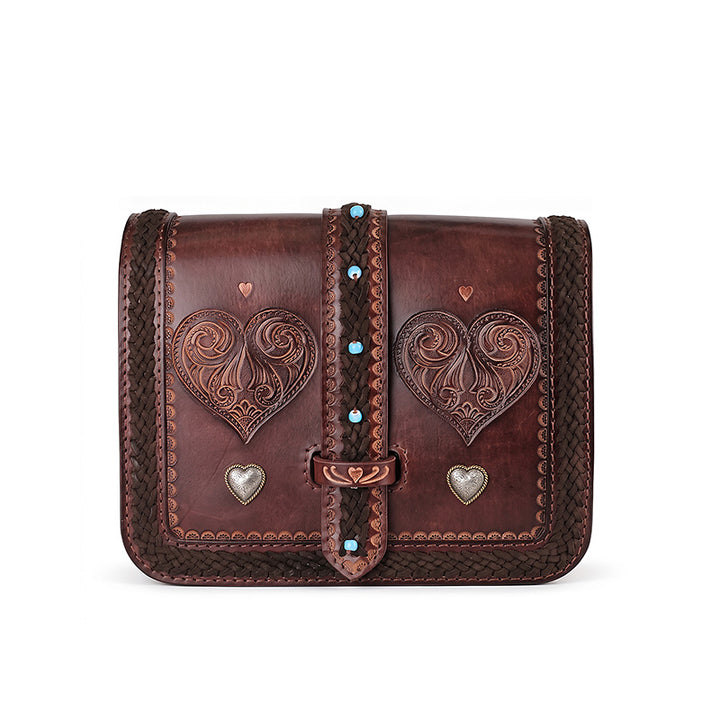 Hand-Tooled Leather Crossbody Bag with Heart Motifs