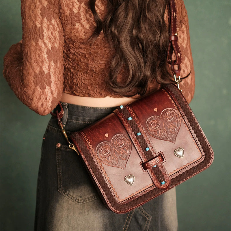 Hand-Tooled Leather Crossbody Bag with Heart Motifs