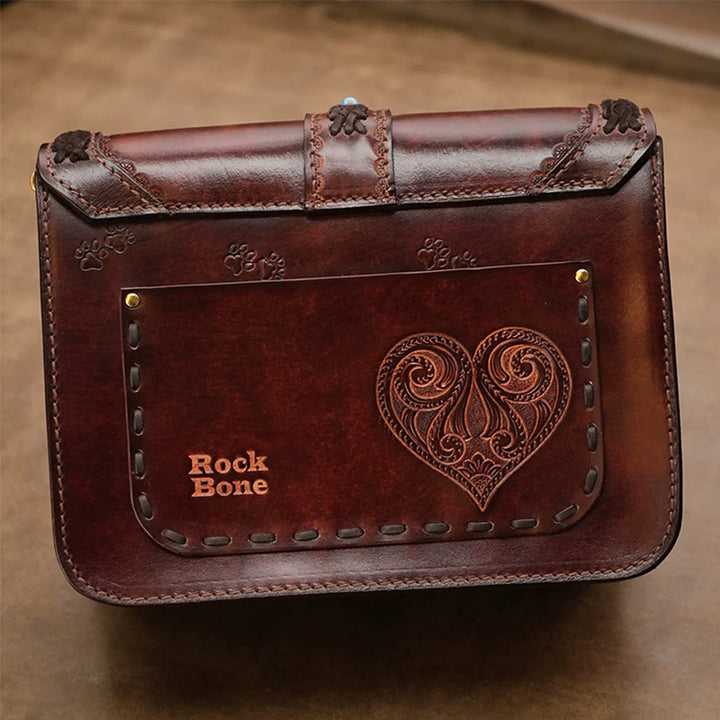 Hand-Tooled Leather Crossbody Bag with Heart Motifs