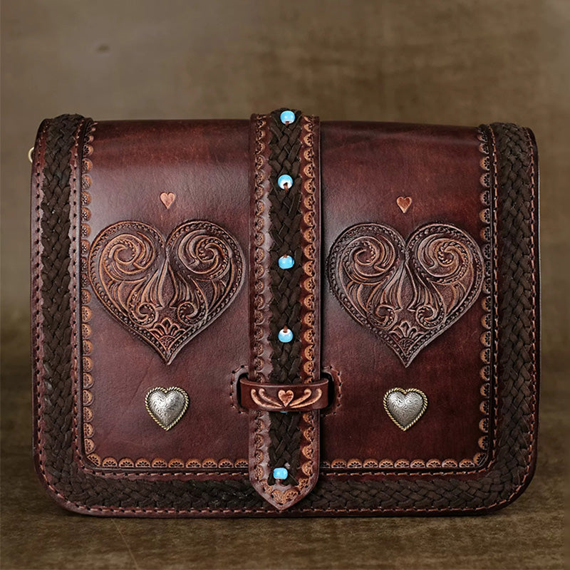 Hand-Tooled Leather Crossbody Bag with Heart Motifs