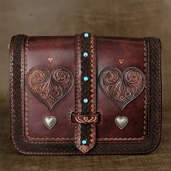 Hand-Tooled Leather Crossbody Bag with Heart Motifs