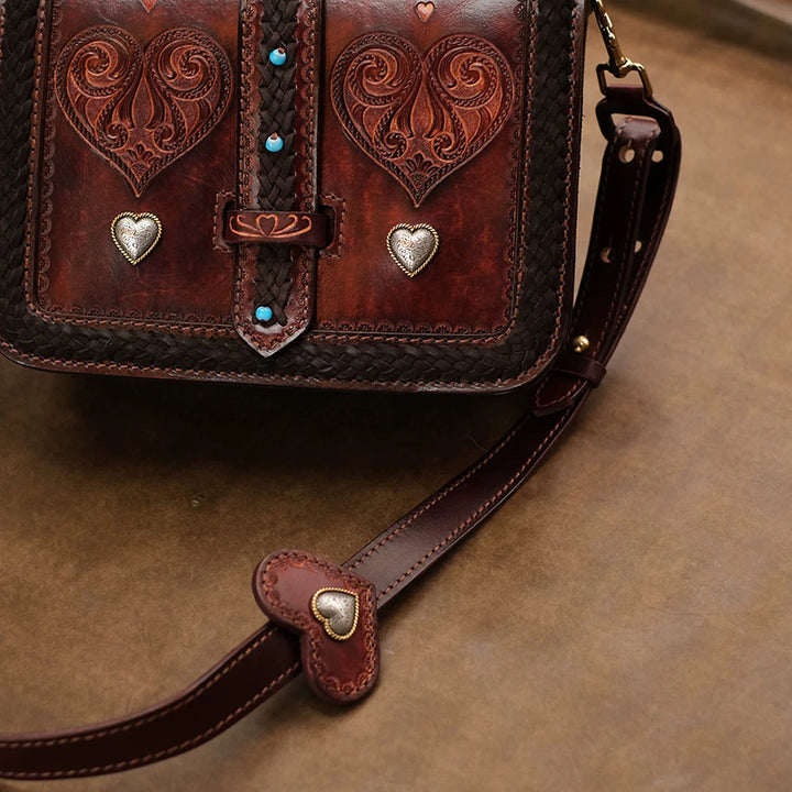 Hand-Tooled Leather Crossbody Bag with Heart Motifs