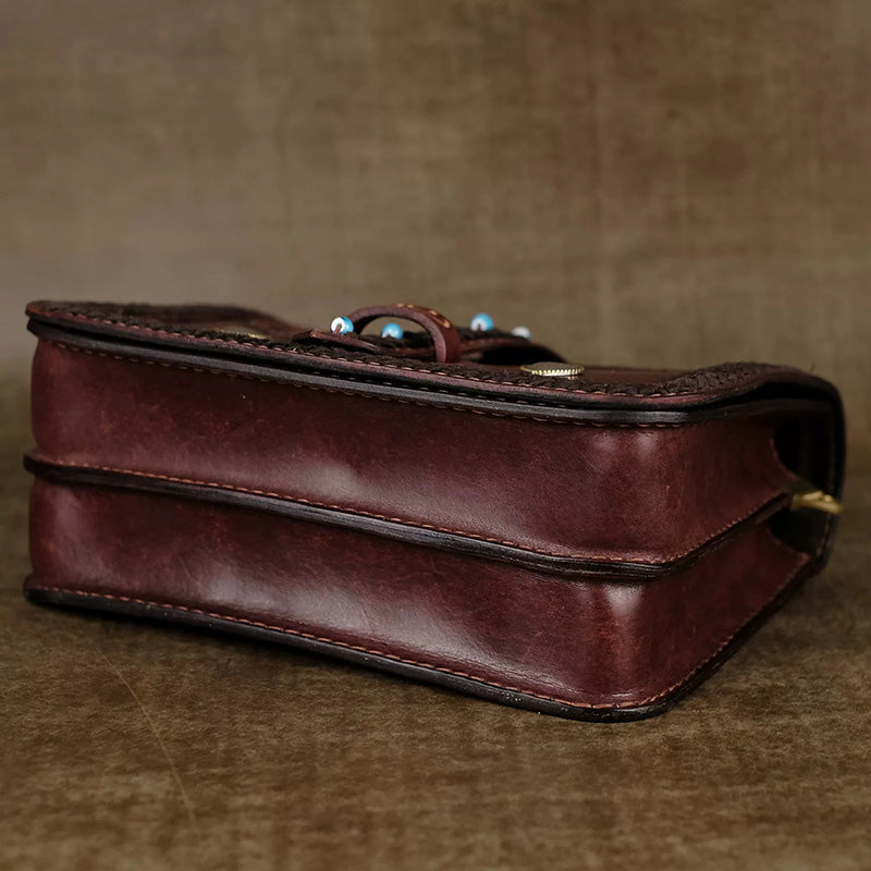 Hand-Tooled Leather Crossbody Bag with Heart Motifs