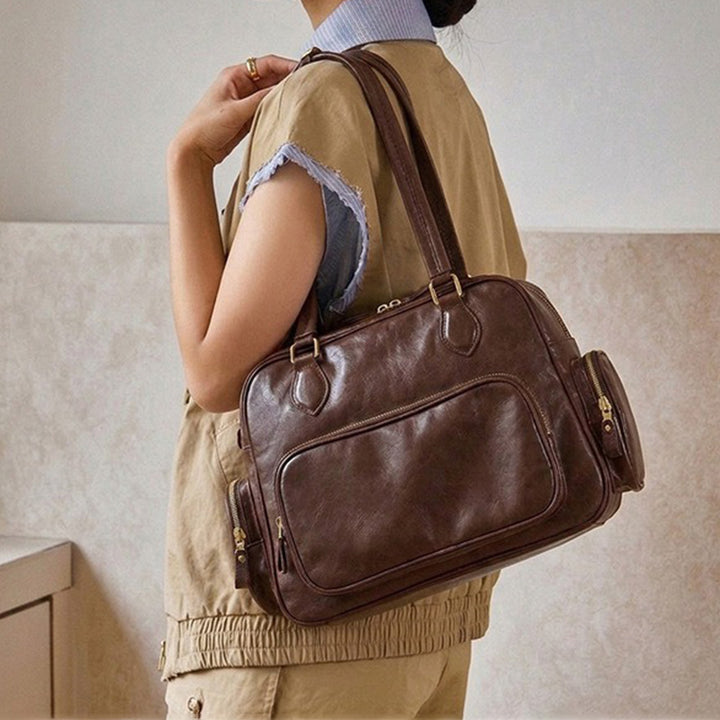 Dwarves Boston Bag with Multiple Pockets in Vegetable-Tanned Leather