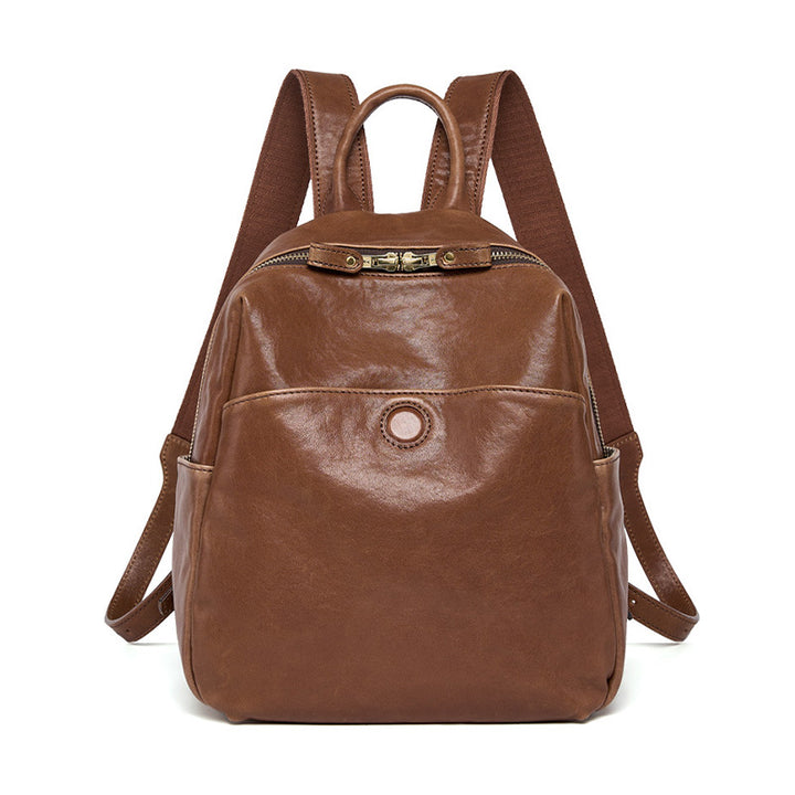 Full grain vegetable tanned cowhide leather backpack in coffee brown, minimalist vintage style