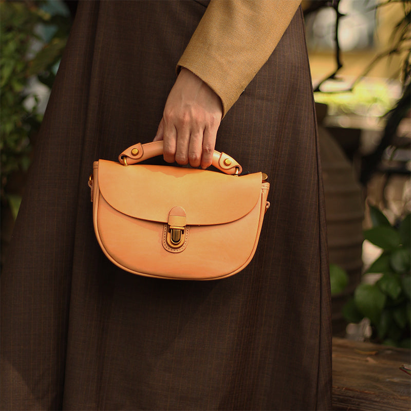 Two-Tone Leather Saddle Bag Vintage Push-Lock Top Handle Crossbody