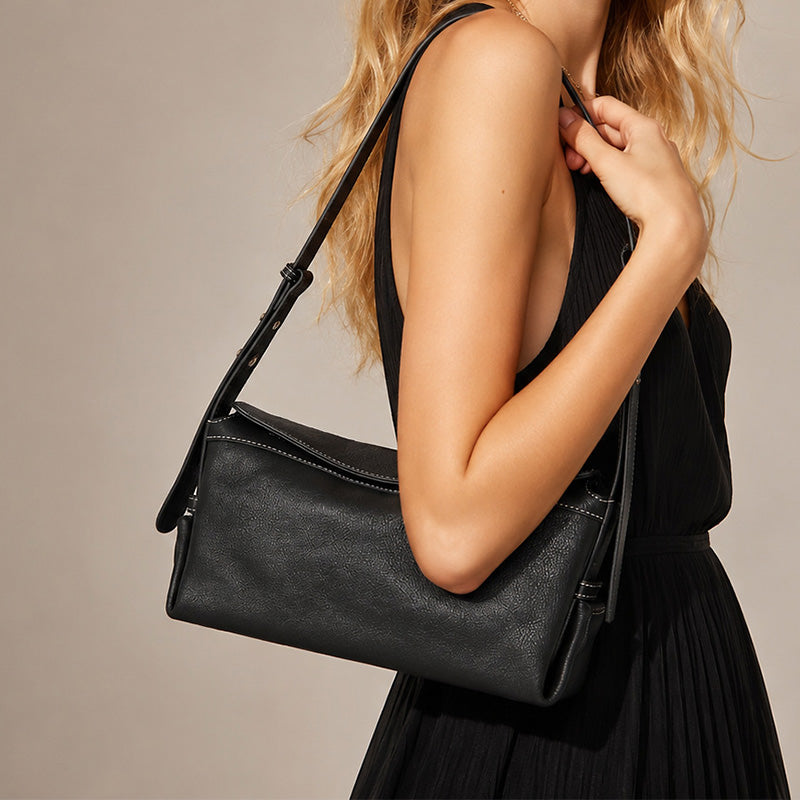 Slouchy black vegetable tanned leather hobo bag with adjustable shoulder strap
