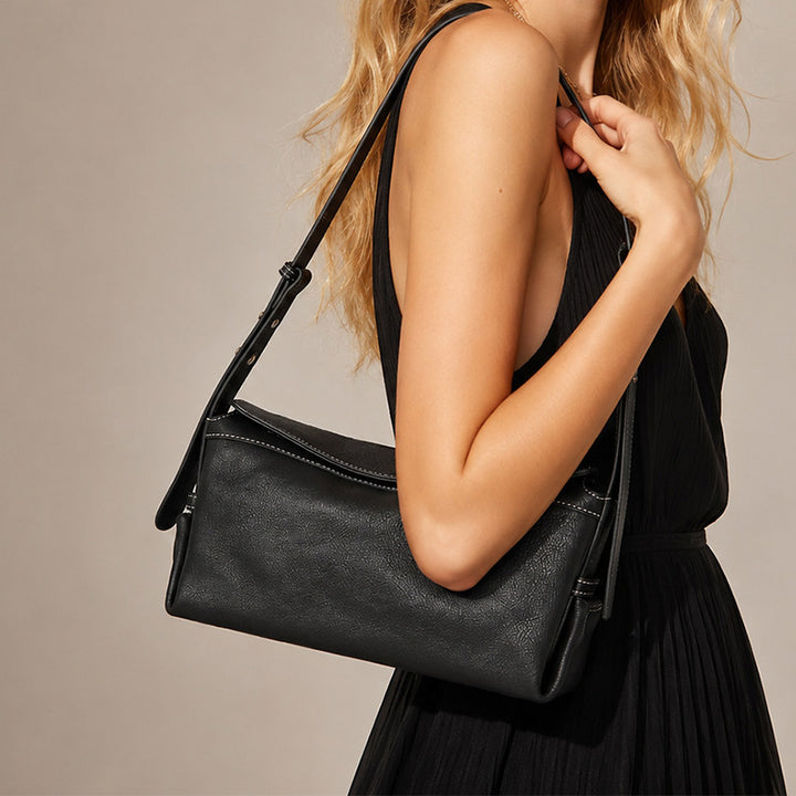 Slouchy black vegetable tanned leather hobo bag with adjustable shoulder strap