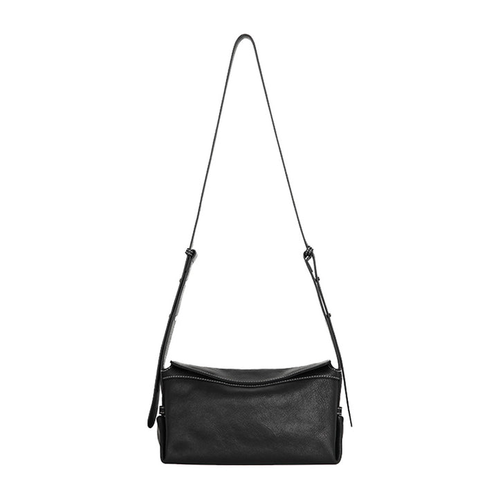 Slouchy black vegetable tanned leather hobo bag with adjustable shoulder strap