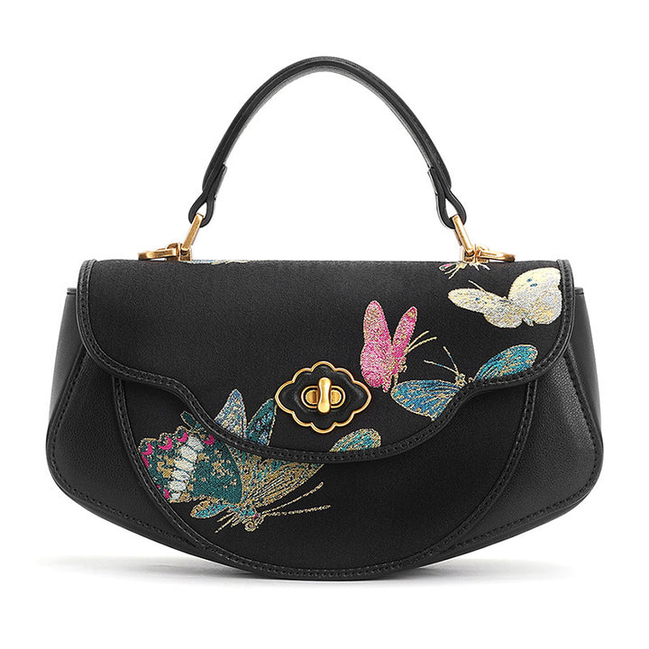 Black leather saddle bag with Song Brocade butterfly motif and shell inlay