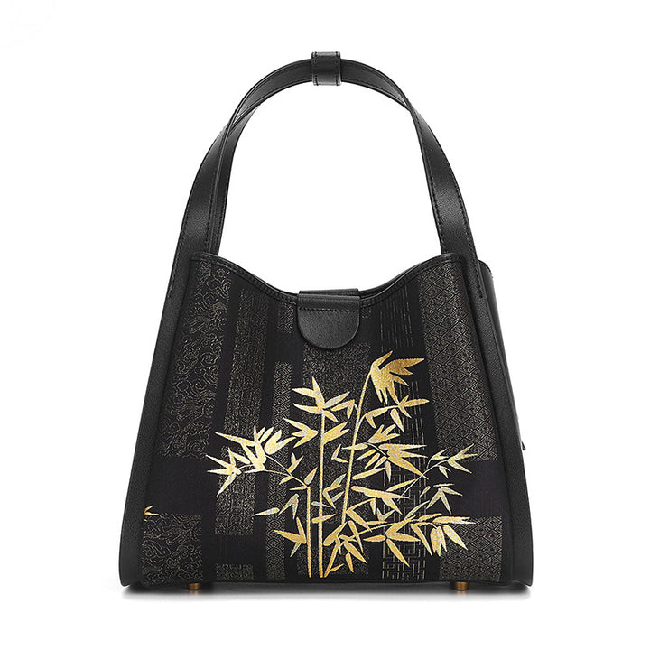 Black cowhide handbag with Song Brocade gold bamboo motif