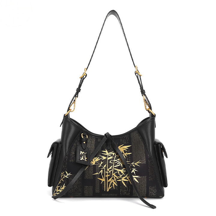 Black cowhide leather shoulder bag with Song Brocade gold bamboo and cloud motif