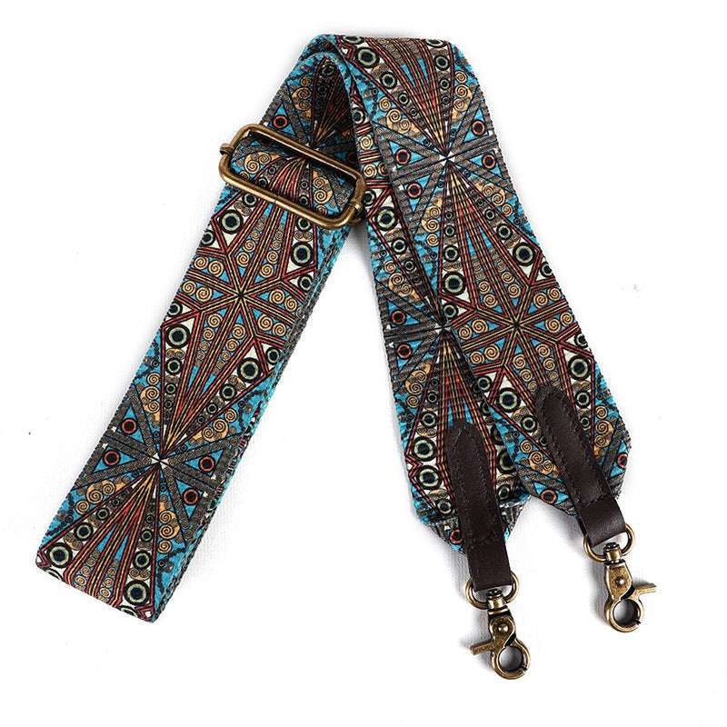 Boho wide bag strap with colorful woven geometric pattern and bronze lobster clasp