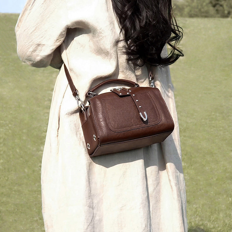 Studded vegetable tanned leather Boston bag in brown with dual detachable straps