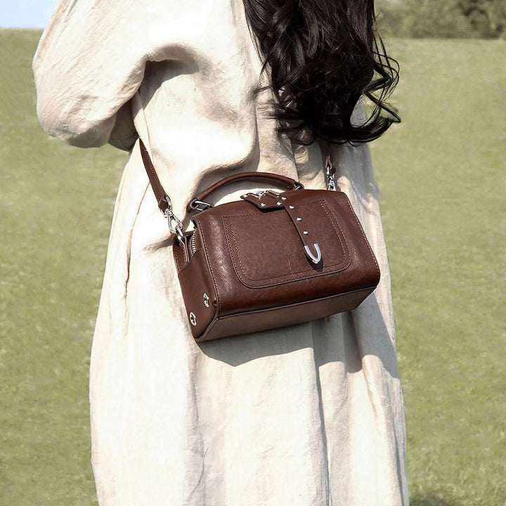 Studded vegetable tanned leather Boston bag in brown with dual detachable straps