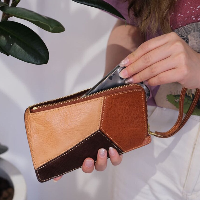 Color block vegetable tanned leather wristlet wallet with zip around closure and wrist strap