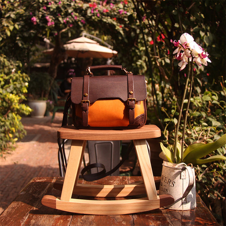 Color block full-grain leather Cambridge satchel bag with brass buckles in yellow and brown