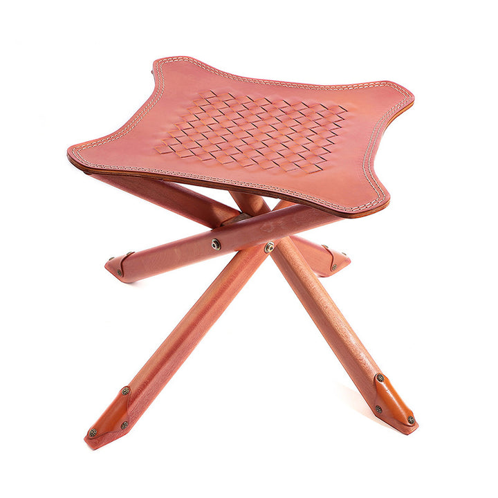 Handwoven cowhide folding stool in yellow — portable leather camping seat with solid wood frame