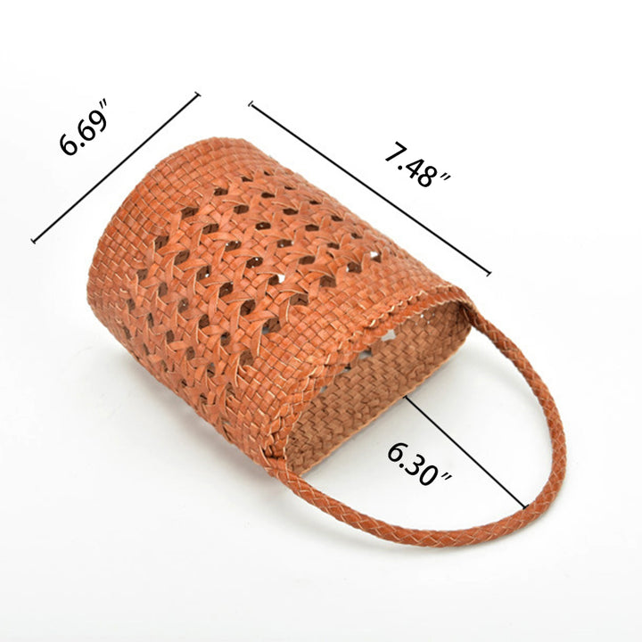 Sac seau cylindrique simple en cuir de vachette évidé