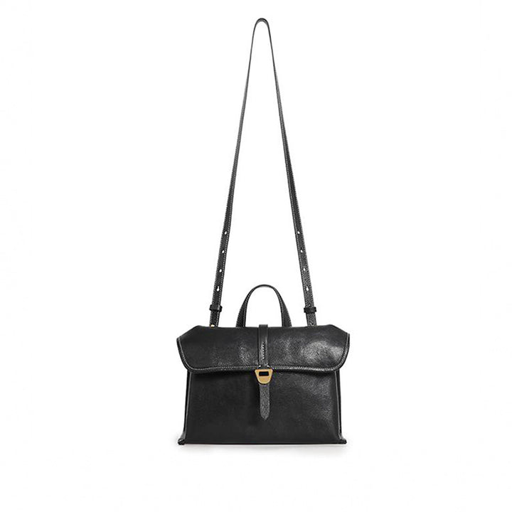 Black vegetable-tanned leather satchel bag with top handles and detachable strap