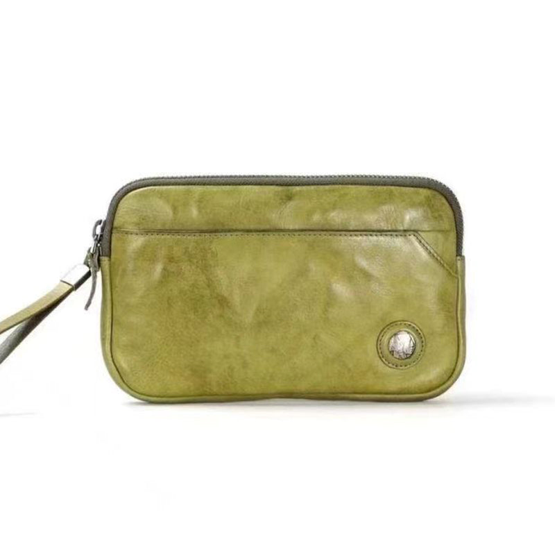 Pochette en cuir tanné végétal, à la fois élégante et raffinée, pour femme