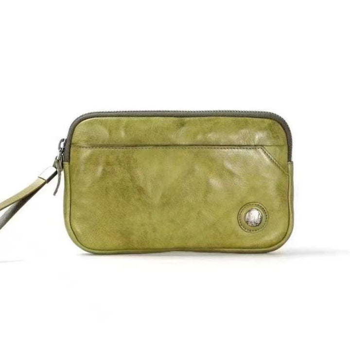 Pochette en cuir tanné végétal, à la fois élégante et raffinée, pour femme