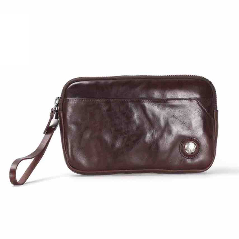 Pochette en cuir tanné végétal, à la fois élégante et raffinée, pour femme