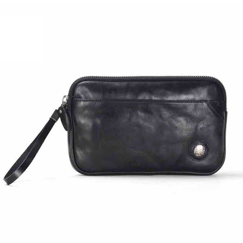 Pochette en cuir tanné végétal, à la fois élégante et raffinée, pour femme