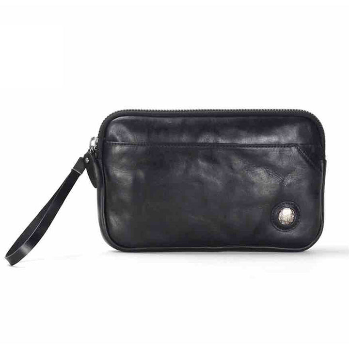 Pochette en cuir tanné végétal, à la fois élégante et raffinée, pour femme