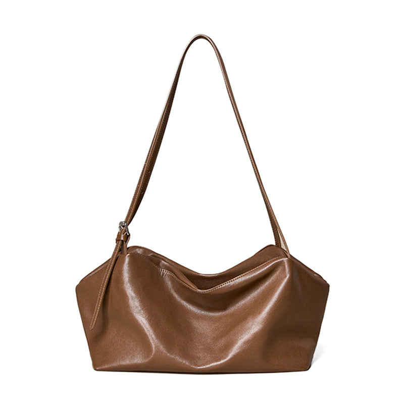 Full-grain vegetable tanned cowhide leather slouchy hobo bag in brown with minimalist no-hardware design