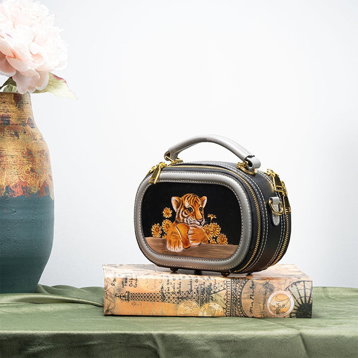 Hand tooled leather Boston bag in black with hand painted tiger cub design on vegetable tanned cowhide