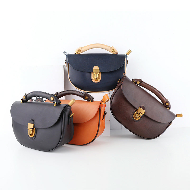 Two-Tone Leather Saddle Bag Vintage Push-Lock Top Handle Crossbody