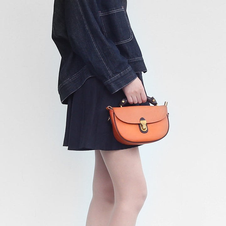 Two-Tone Leather Saddle Bag Vintage Push-Lock Top Handle Crossbody