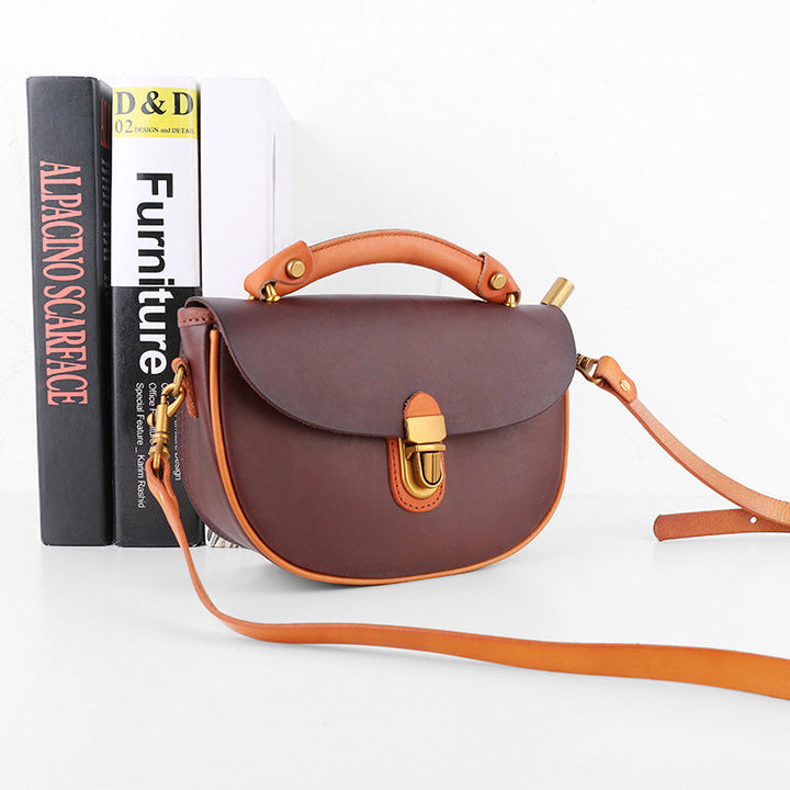 Two-Tone Leather Saddle Bag Vintage Push-Lock Top Handle Crossbody