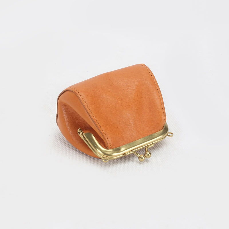 Yellow veg tan leather kiss lock coin purse with gold brass clasp frame