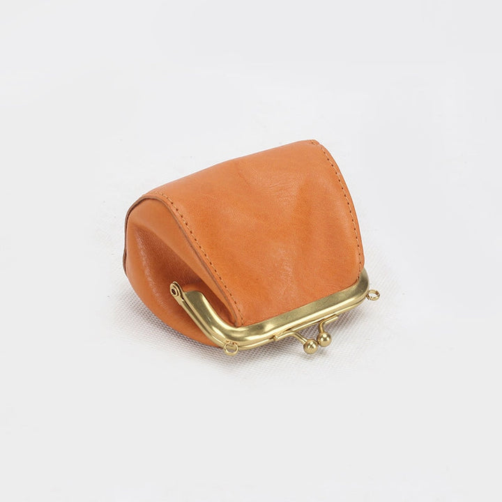 Yellow veg tan leather kiss lock coin purse with gold brass clasp frame